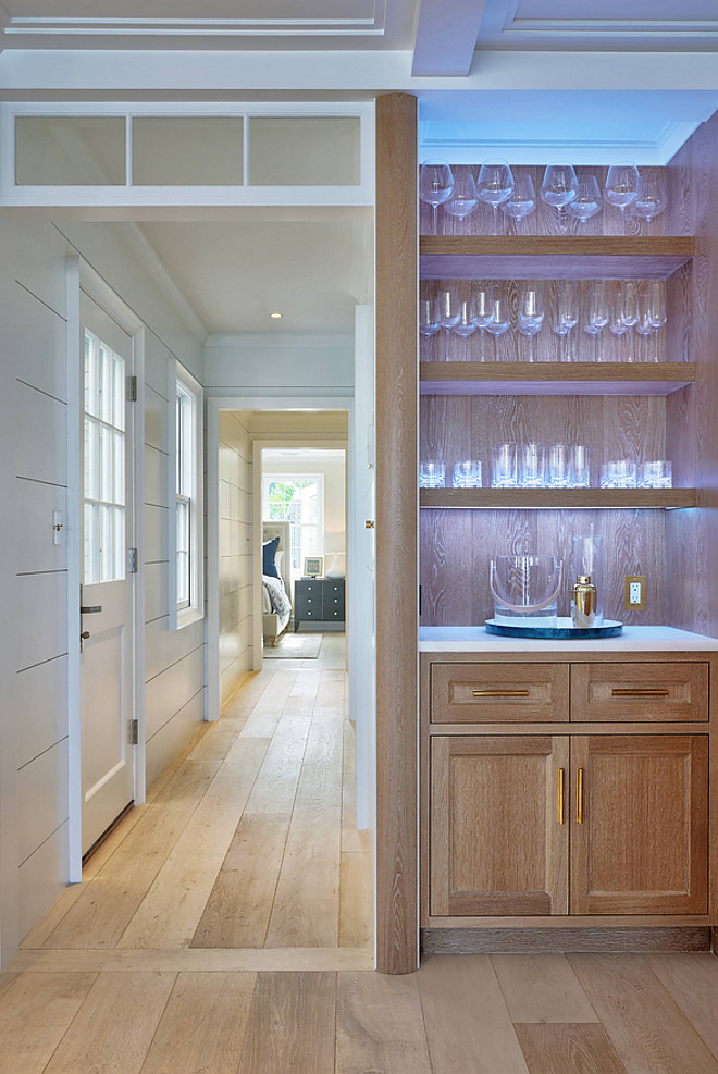 White Oak Bar with under cabinet lighting This White Oak cabinet features chunky shelves and under cabinet lighting Bar under cabinet lighting White Oak Bar with under cabinet lighting #WhiteOakcabinet #Bar #undercabinetlighting