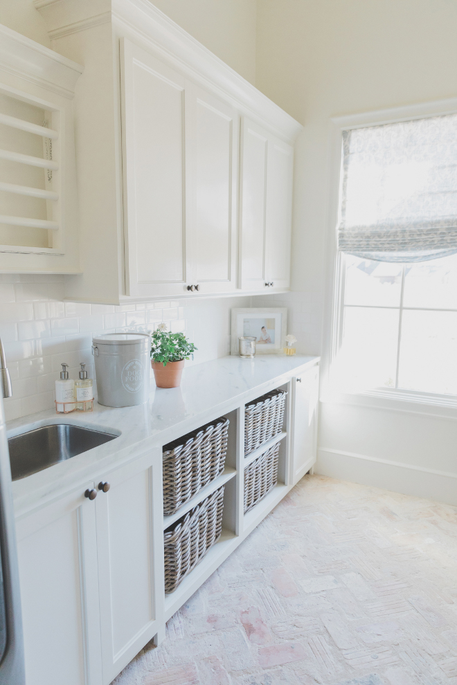 French Farmhouse Laundry Room with herringbone brick flooring Gorgeous French farmhouse laundry room with herringbone brick flooring and creamy white French cabinets Creamy White French Farmhouse Laundry Room with herringbone brick flooring French Farmhouse Laundry Room with herringbone brick flooring #FrenchFarmhouse LaundryRoom #FarmhouseLaundryRoom #FrenchLaundryRoom #Creamywhite #herringbonebrickflooring