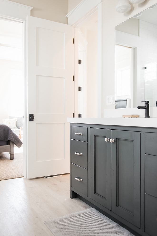 Neutral Bathroom with grey cabinet