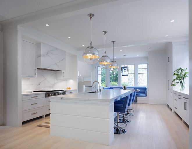 Modern White Kitchen with bleached hardwood floors Modern White Kitchen #ModernWhiteKitchen