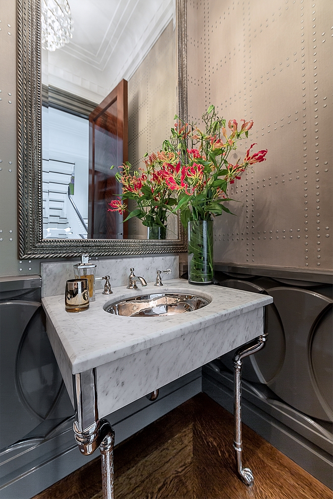 Powder Room Wainscoting Notice the stunning wainscoting this powder room features #PowderRoom #Wainscoting