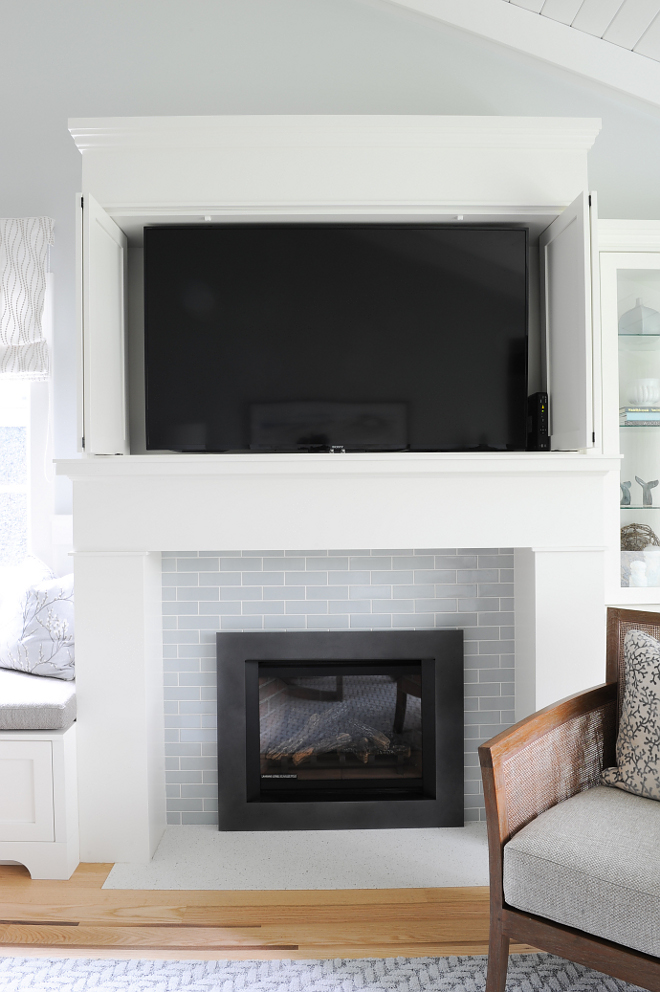 Concealed tv above fireplace
