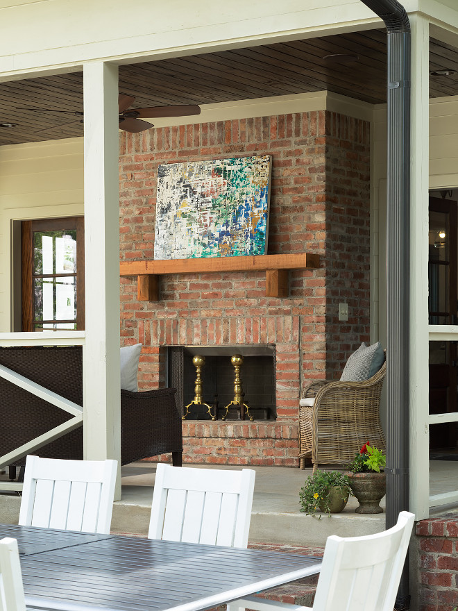 Outdoor Brick Fireplace with timber mantel sources on Home Bunch