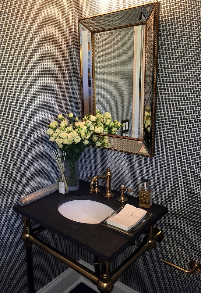 Powder room with textured wallpaper and silver bead mirror sources on Home Bunch #texturewallpaper