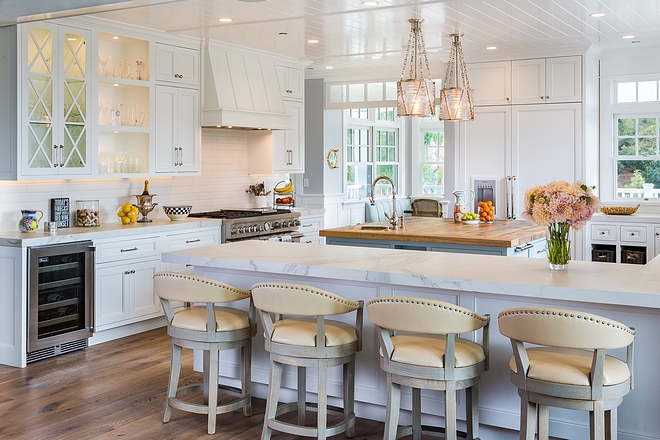 Beach House Kitchen with white cabinets and white oak hardwood floors paint color on Home Bunch #Kitchen #BeachHouseKitchen