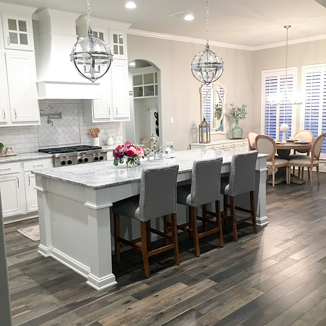 White Kitchen with grey-stained hardwood floors White Kitchen with grey-stained hardwood floor ideas #WhiteKitchen #greyhardwoodfloors