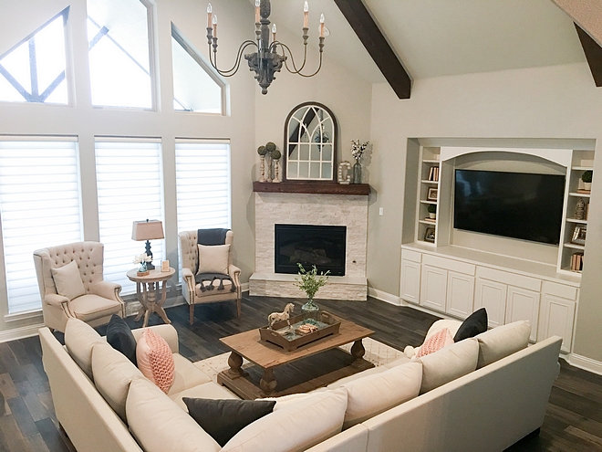 Corner Fireplace Fireplace surround Floor and Décor Rock Ridge Glacier Split Face Quartzite The living room features a corner fireplace and built-in media cabinets